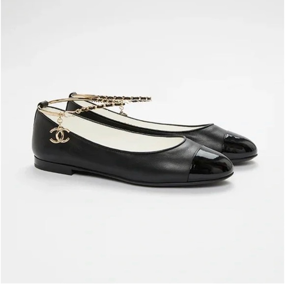 CHANEL Shoes - CHANEL Black Leather Cap-Toe Ballet Flats with Gold Chain Ankle Charm